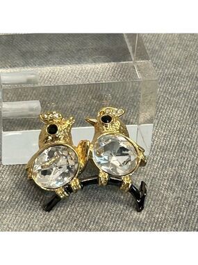 Two crystal rhinestone love birds on a branch brooch pin
